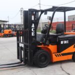 ACE AF30E electric forklift in an outdoor warehouse setting in India.