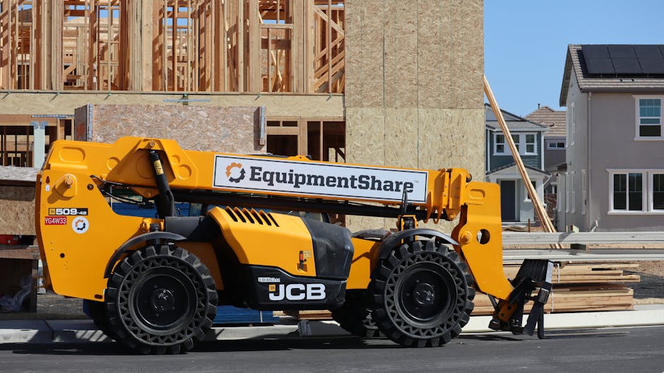 JCB forklift at a construction site in Elk Grove, California. Suburban housing development progress.